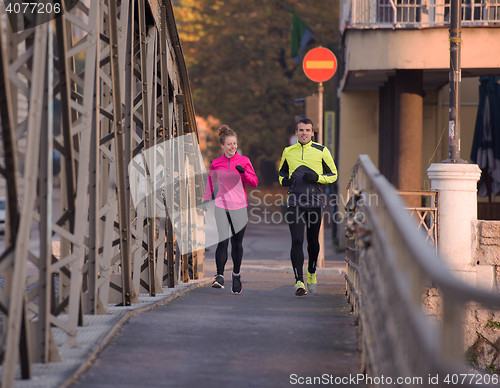 Image of young  couple jogging