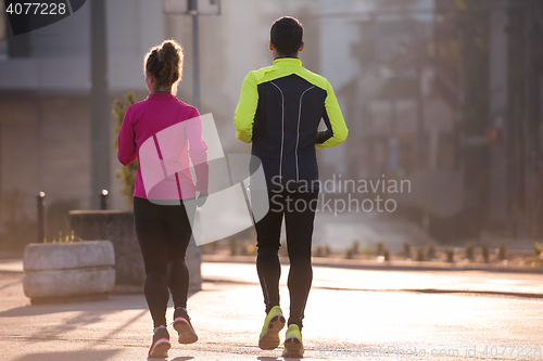 Image of young  couple jogging