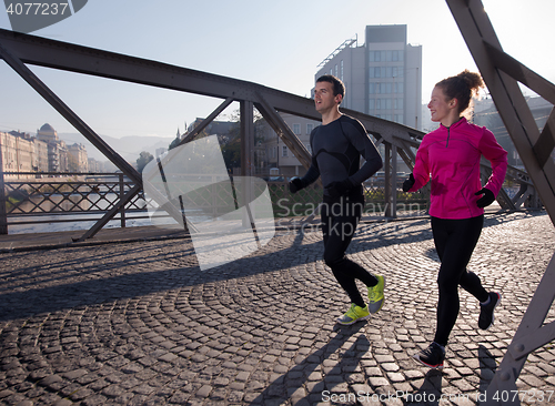 Image of young  couple jogging