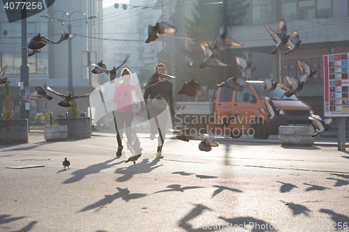 Image of young  couple jogging
