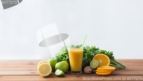 Image of glass of orange juice, fruits and vegetables