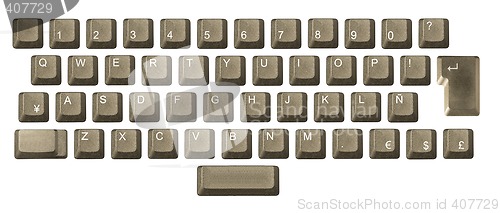 Image of computer key in a keyboard with letter, number and symbols