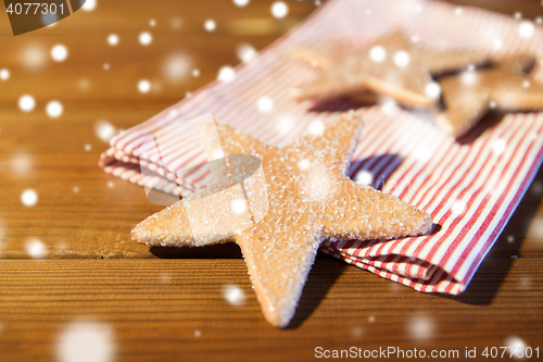 Image of close up of gingerbread cookies and towel