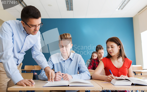 Image of group of students and teacher at school classroom