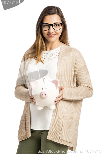 Image of Woman holding piggybank