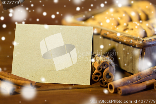 Image of close up of christmas oat cookies on wooden table