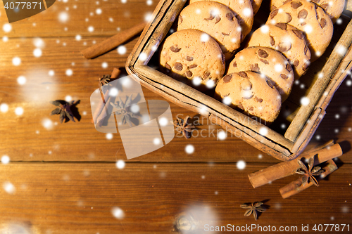 Image of close up of oat cookies on wooden table