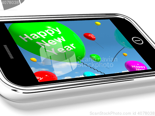 Image of Mobile With Happy New Year Message On Screen