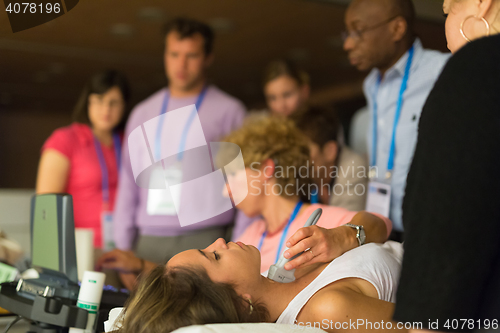 Image of Participants learning new ultrasound techniques on medical congress.