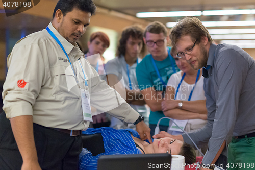 Image of Participants learning new ultrasound techniques on medical congress.