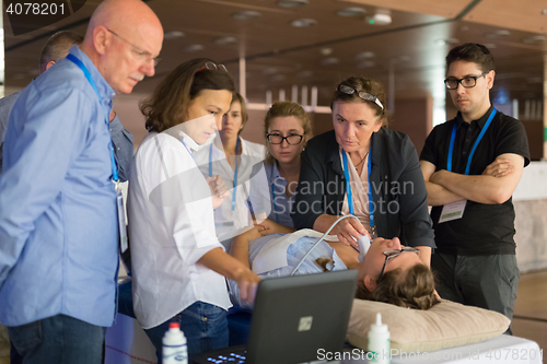 Image of Participants learning new ultrasound techniques on medical congress.