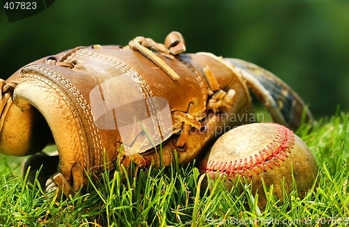 Image of Old glove and baseball