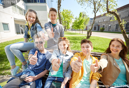 Image of group of students with tablet pc at school yard