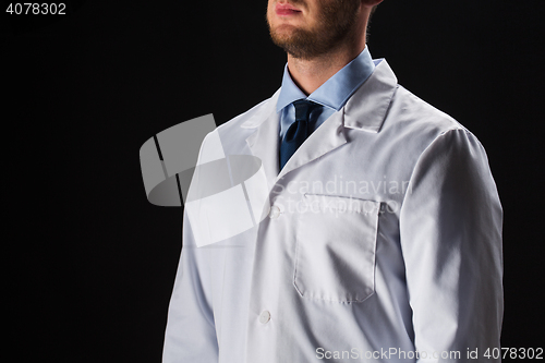 Image of close up of male doctor in white coat