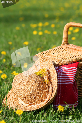 Image of Picnic basket and hat