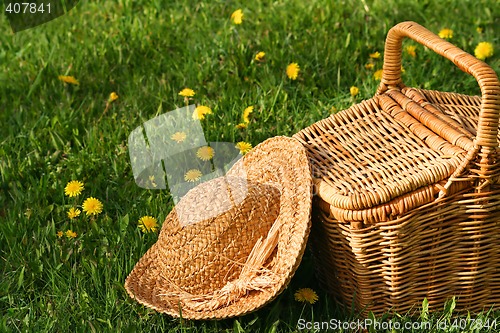 Image of Summer hat and wicker basket