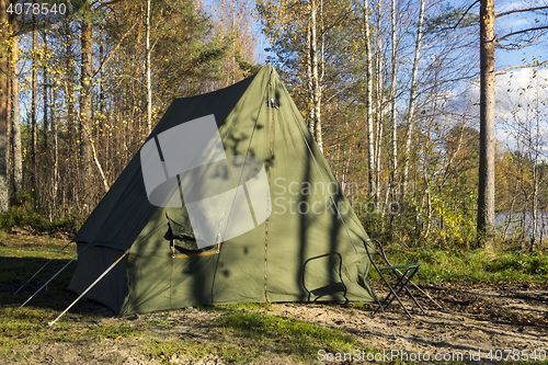 Image of Oldschool camp tent in forest