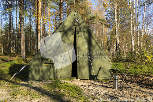 Image of Oldschool tent in forest camp