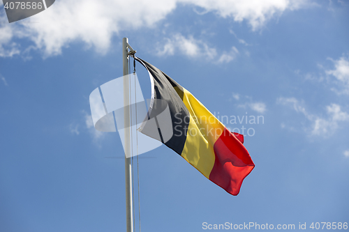 Image of National flag of Belgium on a flagpole