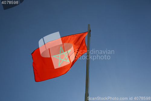 Image of National flag of Morocco on a flagpole