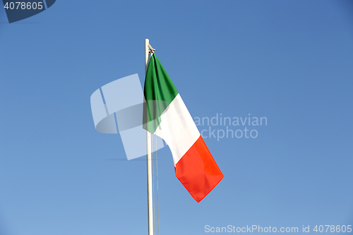 Image of National flag of Italy on a flagpole