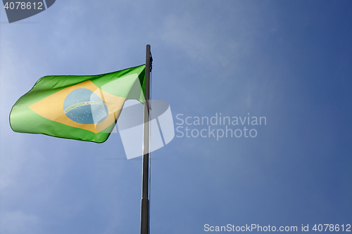 Image of National flag of Brazil on a flagpole