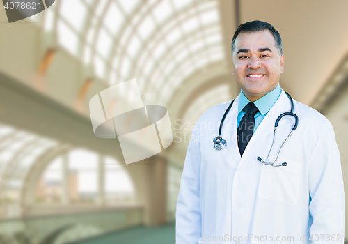 Image of Handsome Hispanic Male Doctor or Nurse Inside Hospital Building