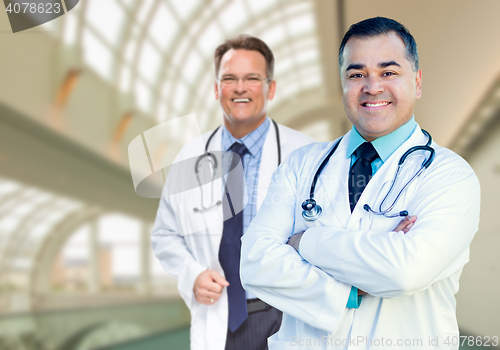 Image of Handsome Male Doctors or Nurses Inside Hospital Building