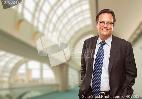 Image of Happy Businessman Inside Corporate Building