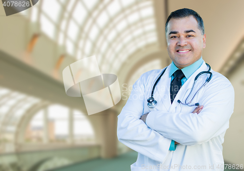 Image of Handsome Hispanic Male Doctor or Nurse Inside Hospital Building