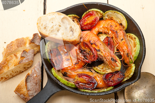 Image of roasted shrimps with zucchini and tomatoes