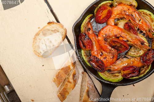 Image of roasted shrimps with zucchini and tomatoes
