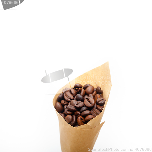 Image of espresso coffee beans on a paper cone