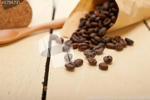 Image of espresso coffee beans on a paper cone