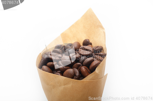 Image of espresso coffee beans on a paper cone