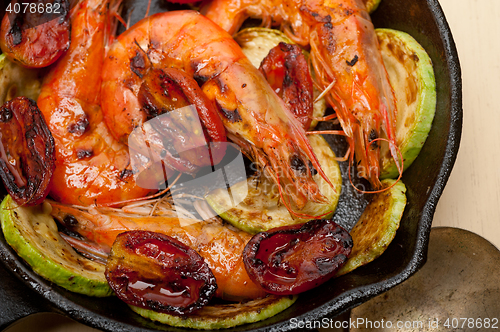 Image of roasted shrimps with zucchini and tomatoes