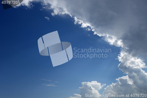 Image of Blue sky with rain clouds 