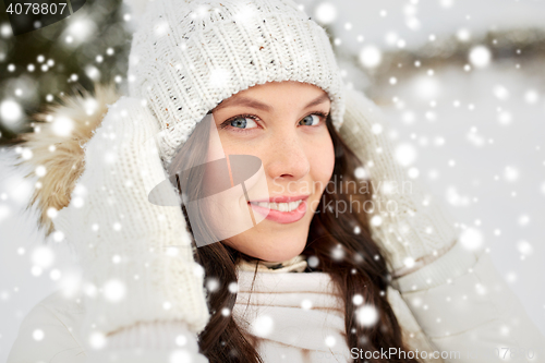 Image of happy woman outdoors in winter