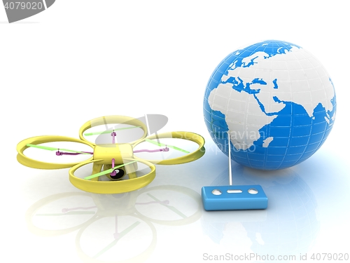 Image of Quadrocopter Drone with Earth Globe and remote controller on a w