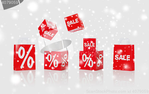 Image of shopping bags with sale and percent signs