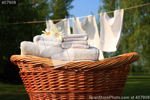 Image of Wicker basket with laundry