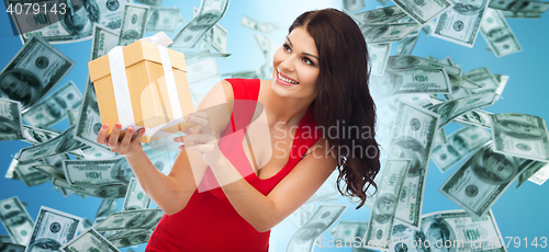 Image of beautiful sexy woman in red dress with gift box