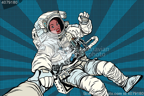 Image of Woman astronaut African American gesture OK