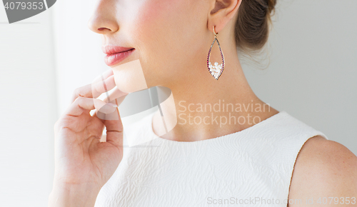 Image of close up of beautiful woman face with earring