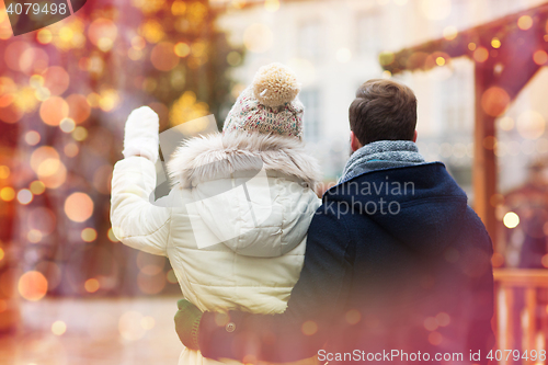 Image of close up of couple in old town at christmas