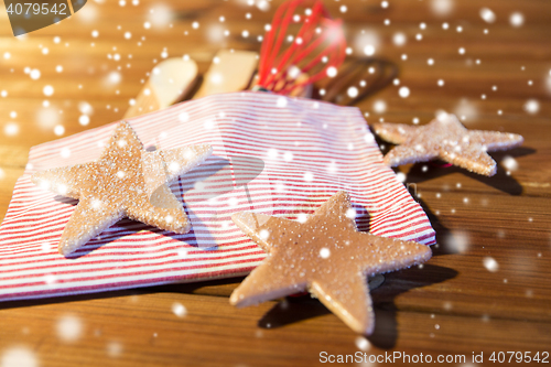 Image of close up of gingerbread and baking kitchenware set