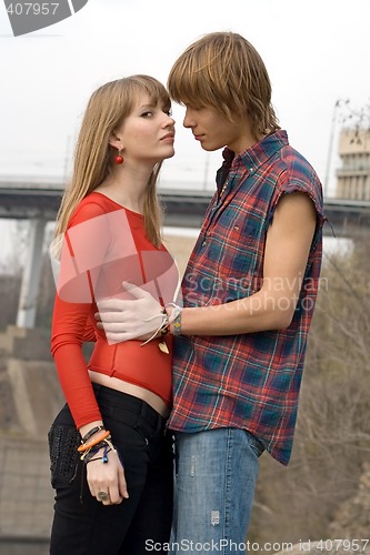 Image of Young couple - the guy and the girl outdoor 8