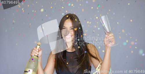 Image of Vivacious woman partying at New Year