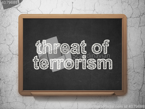 Image of Politics concept: Threat Of Terrorism on chalkboard background