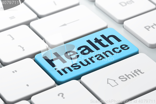 Image of Insurance concept: Health Insurance on computer keyboard background